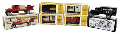 Lot 178 - A group of boxed retro style tinplate lorries...