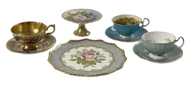 Lot 309 - Three cups and saucers by Aynsley, two with...