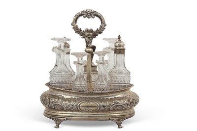 Lot 266 - A late Victorian seven bottle silver cruet of...