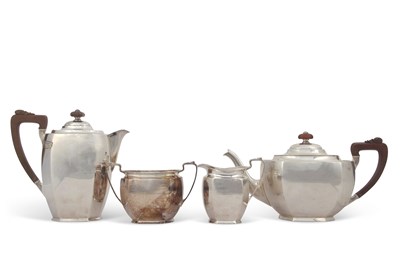 Lot 332 - A George VI silver four piece tea service of...