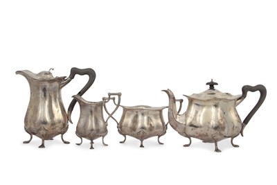 Lot 271 - An Edwardian silver four piece tea service of...