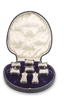 Lot 282 - Cased George V silver eight piece condiment...