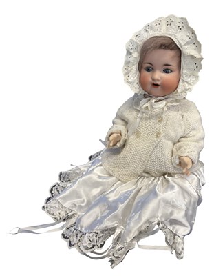 Lot 228 - An Armand Marseille bisque head doll, with...