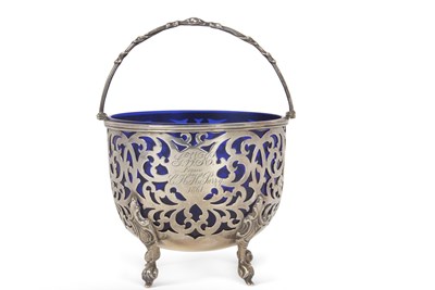 Lot 290 - A Victorian silver swing handle sugar basket,...