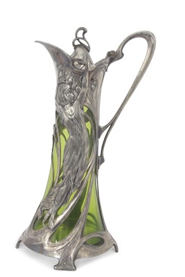 Lot 302 - An Art Nouveau W. M. F pewter and green glass...