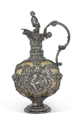 Lot 305 - An antique amber glass and metal overlaid...