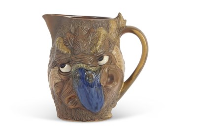 Lot 91 - A Burslem pottery grotesque owl jug designed...