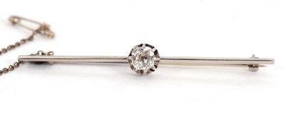 Lot 158 - AMENDED SIZE: A diamond bar brooch, the single...