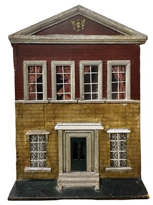 Lot 237 - A vintage dolls house with removable front...
