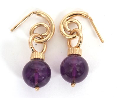 Lot 178 - A pair of 9ct amethyst earrings, set with an...