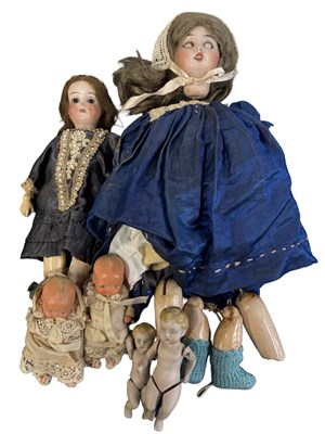 Lot 226 - A collection of various small bisque dolls, to...