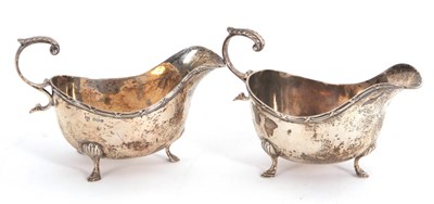 Lot 2 - A pair of George V silver sauce boats of...