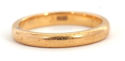 Lot 234 - A gold wedding band, stamped 22ct, size R, 5.9g