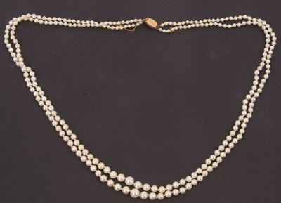 Lot 239 - A 9ct two strand cultured pearl necklace, the...