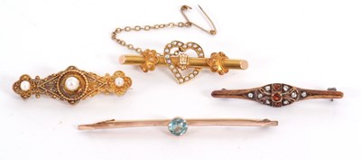 Lot 209 - Four brooches: to include a 15ct seed pearl...