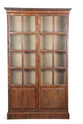 Lot 387 - A large 19th Century walnut veneered bookcase...