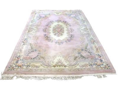 Lot 420 - A large 20th Century Chinese washed wool floor...