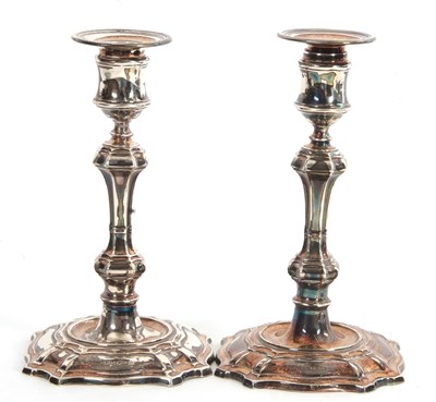 Lot 34 - A pair of Elizabeth II silver candlesticks...
