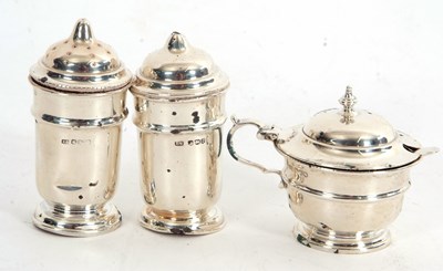 Lot 37 - A George V silver three piece condiment set...