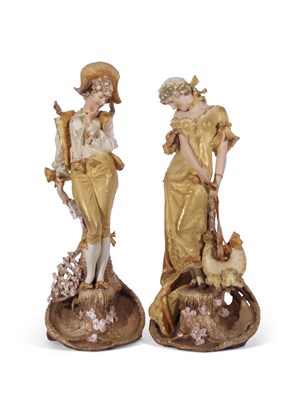Lot 22 - Pair of early 20th century Continental figures...