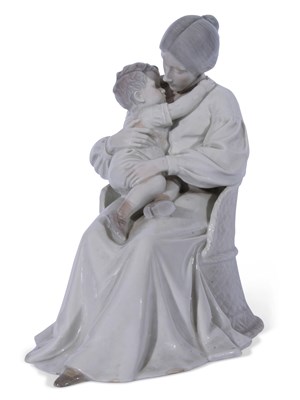 Lot 23 - Large Royal Copenhagen model of a lady seated...