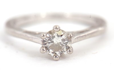 Lot 67 - An IGI certified diamond solitaire ring, the...