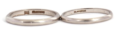 Lot 233 - Two wedding bands, both stamped 'Platinum',...