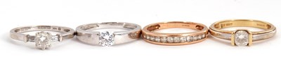 Lot 254 - Four 14ct and CZ rings: to include a 14ct...