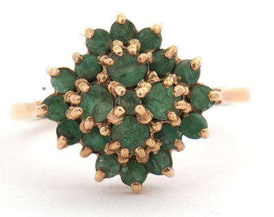 Lot 98 - A 9ct emerald cluster ring, set throughout...