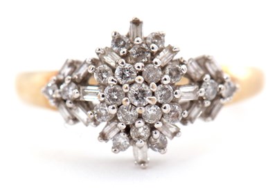 Lot 97 - A 9ct diamond cluster ring, set with round...