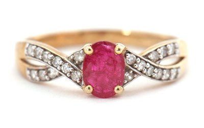 Lot 96 - A 9ct ruby and diamond ring, the central oval...