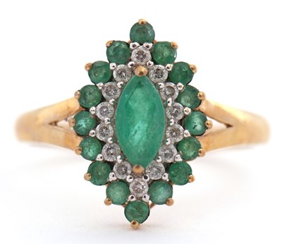 Lot 28 - A 9ct emerald and diamond cluster ring, set...