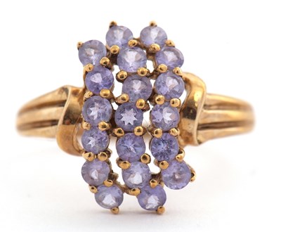 Lot 20 - A 9ct tanzanite ring, set with three rows of...