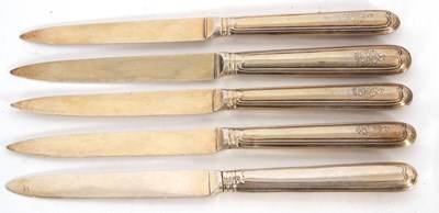 Lot 76 - A group of five dessert knives, one with the...