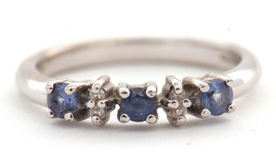 Lot 51 - A 9ct diamond and benitoite ring, set with...