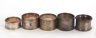 Lot 88 - A group of five hallmarked silver serviette...