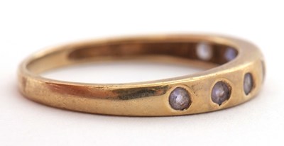 Lot 36 - A 9ct tanzanite ring, with small round...