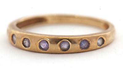 Lot 36 - A 9ct tanzanite ring, with small round...