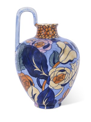 Lot 29 - Bursley ware ewer with a design of flowers on...