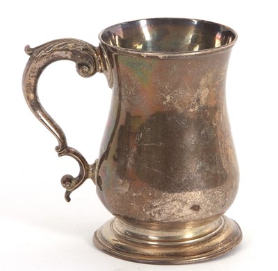 Lot 92 - A George III silver tankard of plain baluster...