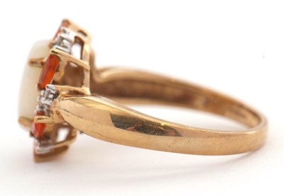 Lot 23 - A 9ct opal, fire opal and diamond ring, the...
