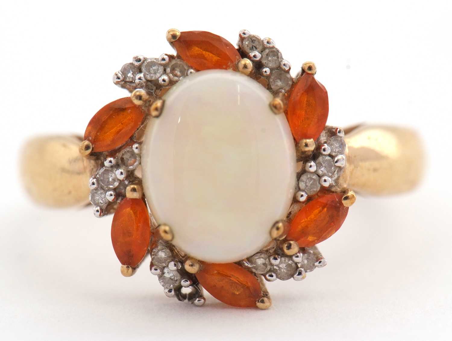 Lot 23 - A 9ct opal, fire opal and diamond ring, the...