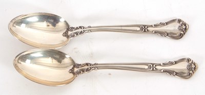 Lot 96 - A pair of "Chantilly" pattern teaspoons,...