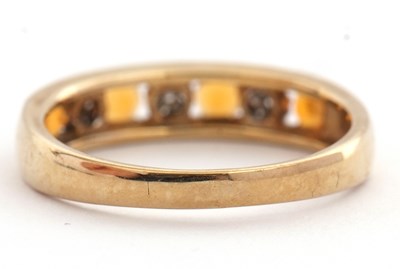 Lot 30 - A 9ct fire opal and diamond ring, the half...