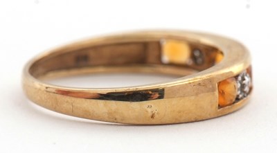 Lot 30 - A 9ct fire opal and diamond ring, the half...
