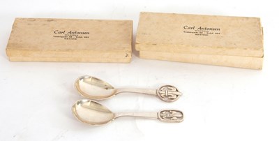 Lot 99 - Two boxed Danish silver decorative spoons...