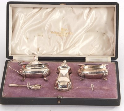 Lot 101 - A George V three piece condiment set...