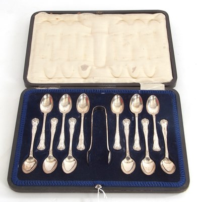 Lot 105 - A cased George V twelve silver teaspoons and...