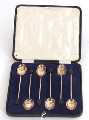 Lot 112 - A cased set of six George V silver bean end...