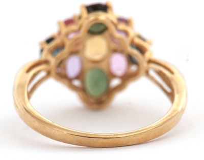 Lot 21 - A 9ct multi gemset ring, set with oval...